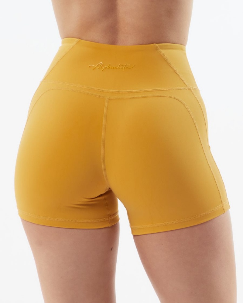 Short Alphalete Pulse Surge Corta 4" Jaune Femme | APY-04645252